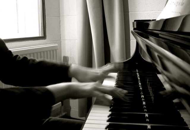 Musicians hear best over the din