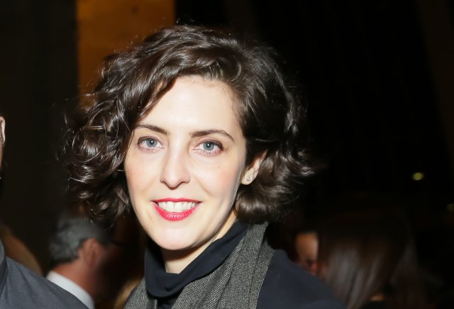 The Woman behind the curtain