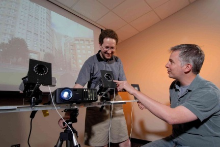 Jay Summet and James Clawson demonstrate their device that will send movie pirates to Davy Jones's locker. [CREDIT: GARY MEEK]