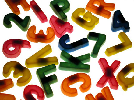 Are humans pre-programmed to understand the concept of language tense? [Number and letter fridge magnets. CREDIT: CRAIG ELLIS]