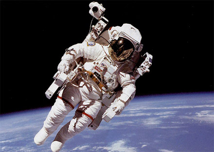 A U.S. astronaut flying high in space. [CREDIT: NASA]