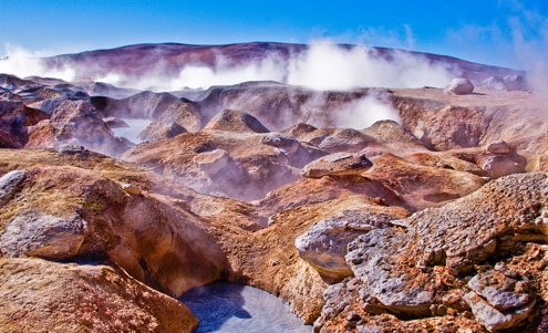 Single-celled organisms called archaea live in the earth's most extreme environments, including geysers.  Scientists are investigating if the little-known branch of life affects human diseases. [Credit: szeke, flickr.com]