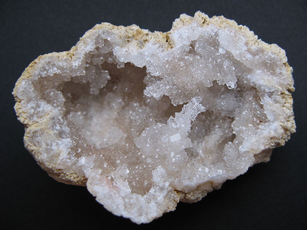 Geodes may be drab on the surface, but these rocks are full of crystallized minerals on the inside. [Image Credit: <a href="http://commons.wikimedia.org/wiki/File:Quartz_geode_from_Morocco.JPG">iRocks.com</a> via Wikimedia Commons]