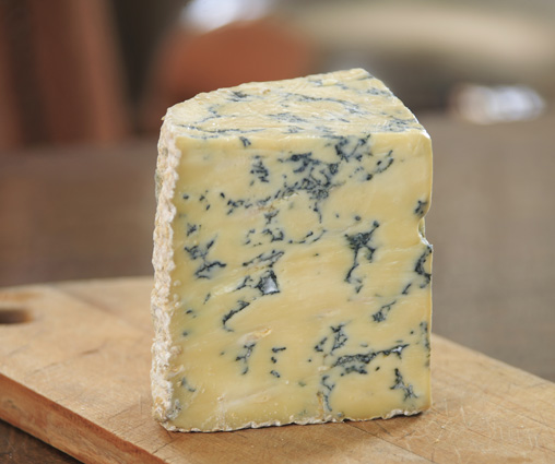 Blue cheeses like Stilton are named for the blue fungus running through the cheese. [Image credit: Designgeist | CC BY 3.0]
