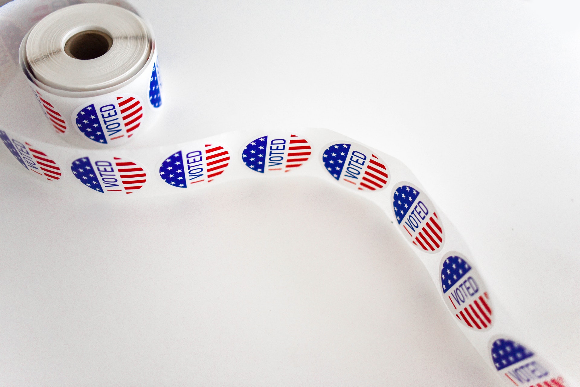 an unfurled roll of "I voted" stickers