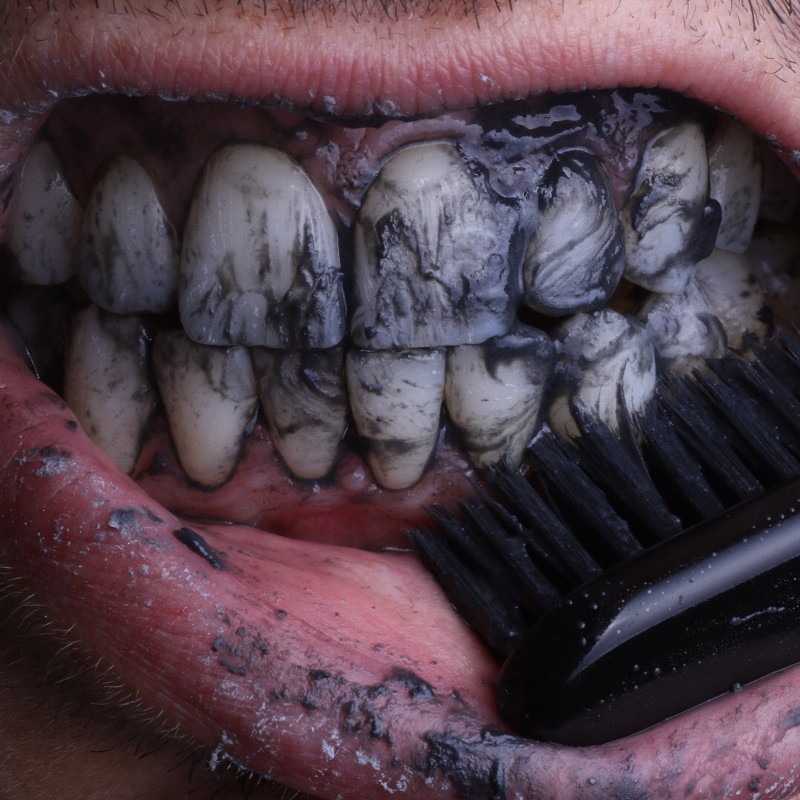 can you brush your tongue with charcoal toothpaste