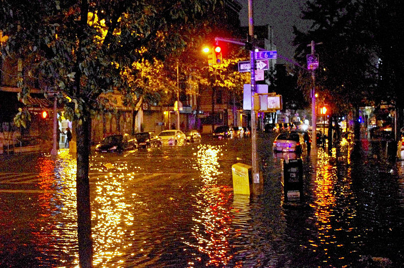 A flooded street at night in Manhattan's East Village.