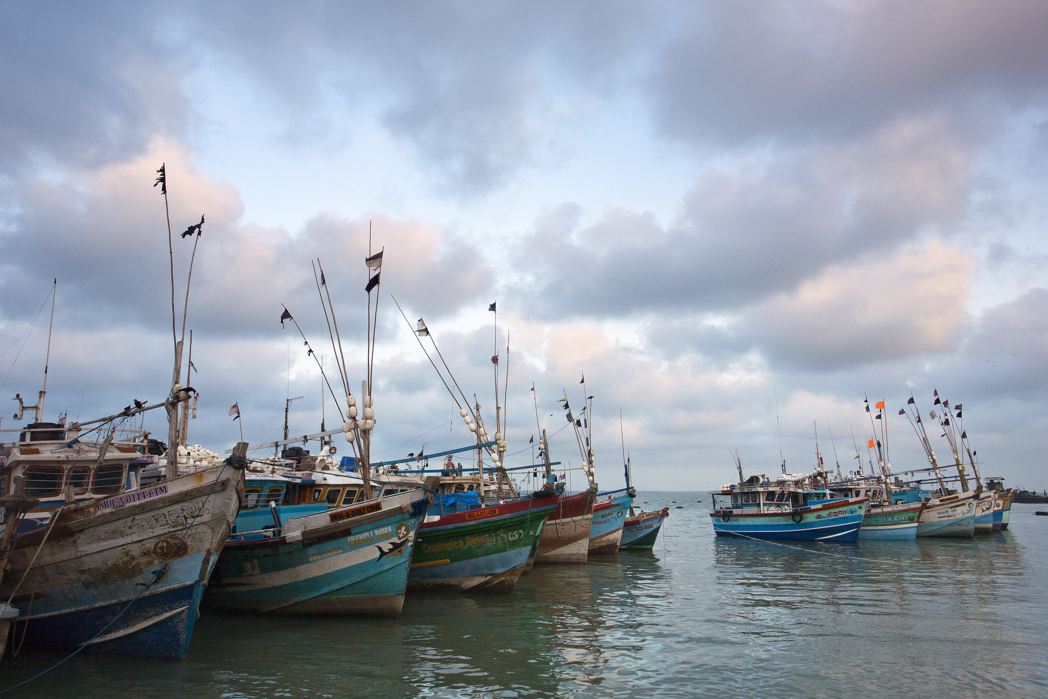 Small fishing boats at dock.