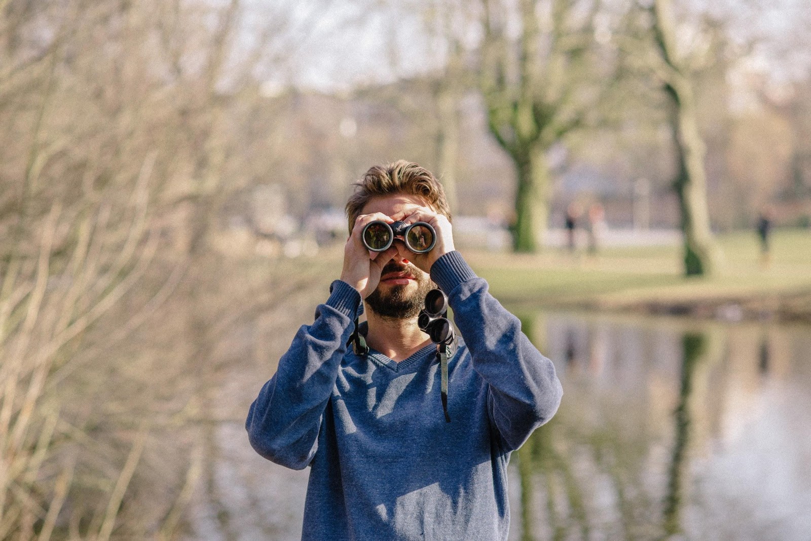 Arjan Dwarshuis looks through his binoculars