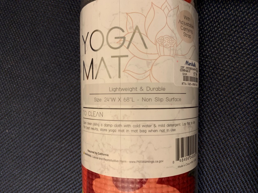 Yoga mat with cancer warning label.