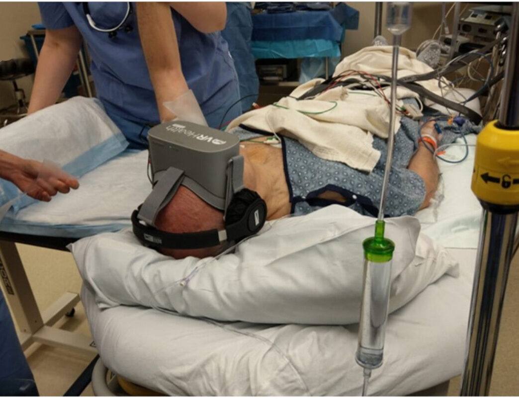 A patient wears a VR headset.